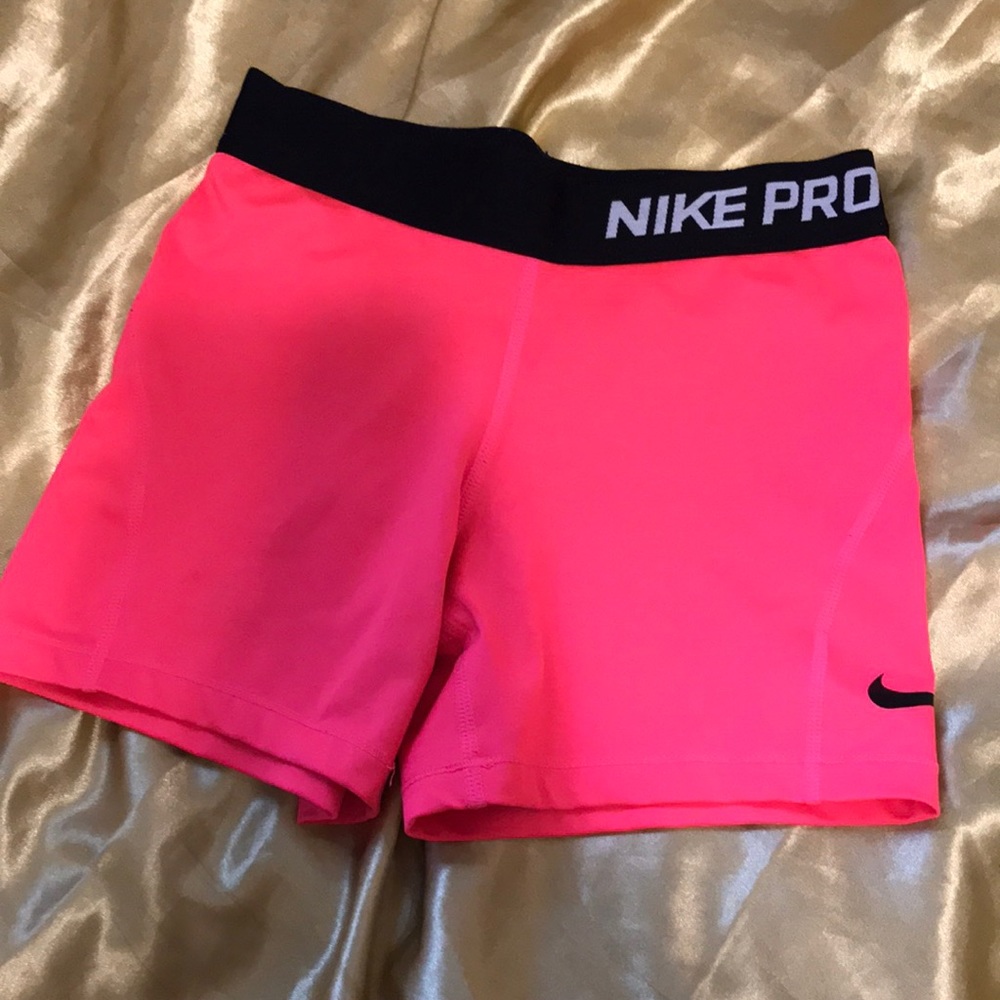 Neon pink nike pro’s
